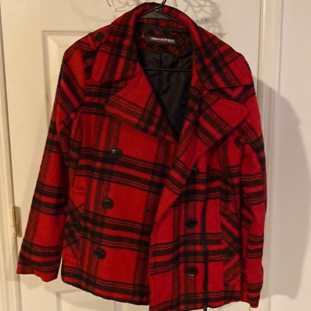 Winter jacket. Looks like pea coat but has zipper to keep it closed.